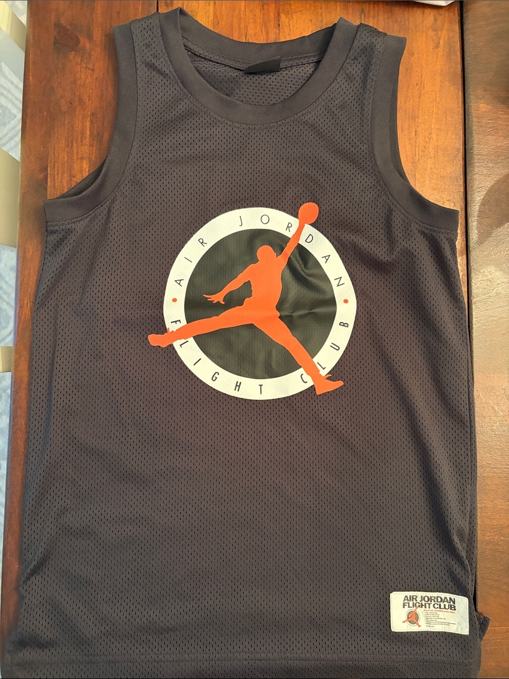 Kids Jordan Air Black Mesh Sleeveless Basketball Top with Orange Jumpman